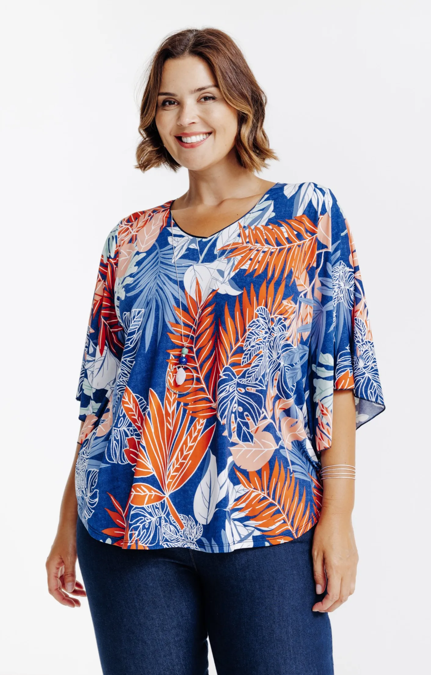 Toscane Boutique Tee-shirt poncho imprimé avec collier| Tee-shirts