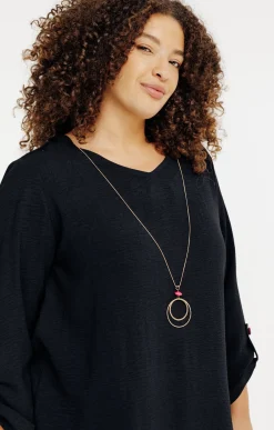 Toscane Boutique Tunique unie avec boutons colorés| Chemisiers & Tuniques